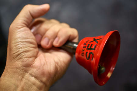Funny bell "Ring for sex", sexual joke, hoaxの写真素材