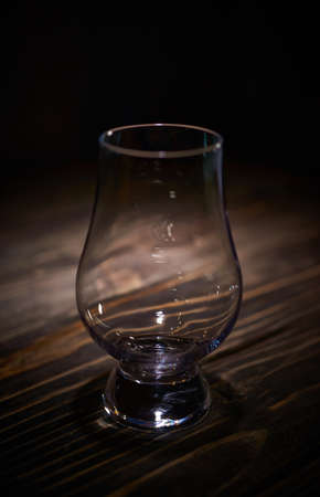 Empty whisky glass, sniffer, tasting crystal glassの写真素材