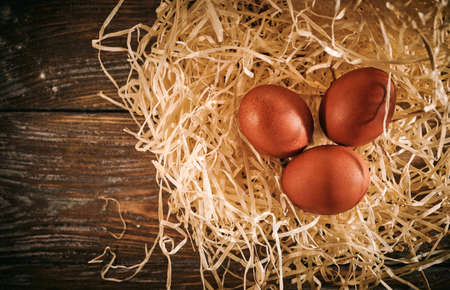 Chicken eggs, raw surface, rural still life, Easter