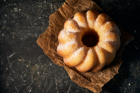 Freshly baked delicious lemon cake covered with sugar powderの写真素材