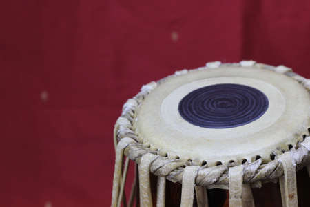 Indian tabla drums on a red background. close upの写真素材