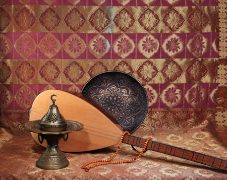 Traditional Turkish lamps, incense burner, rosary beads, national musical instrument baglama saz....