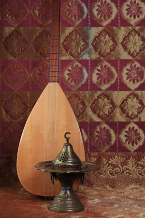 Traditional Turkish lamps, incense burner, national musical instrument baglama saz. symbol of islam. still life.の写真素材