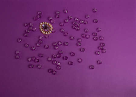 purple beads on a purple backgroundの写真素材