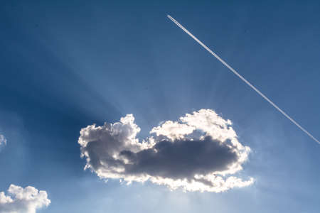 Beautiful white cloud covering the sunの写真素材