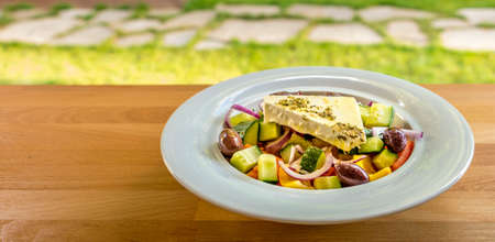 Mixed vegetables greek salad with cheeseの写真素材