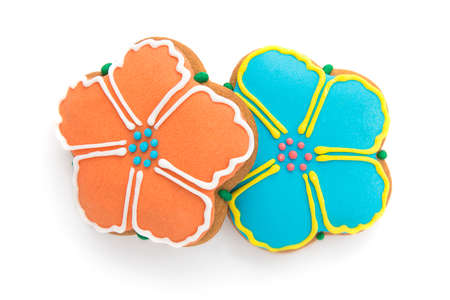 Ginger biscuits in the shape of two flowers painted confectionersの写真素材