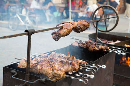 meat on the grill with smokeの写真素材