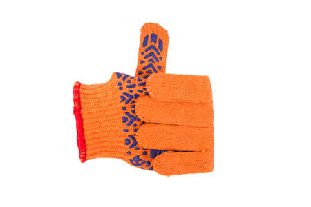 Hand wearing orange textile glove shows OK