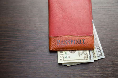 Passport with 20 billsの写真素材