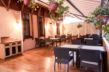 blurred background summer terrace in a restaurant without peopleの写真素材