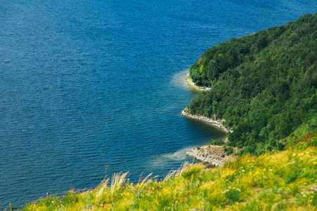Beautiful river landscape and sunshine in Bakota, Ukraineの写真素材
