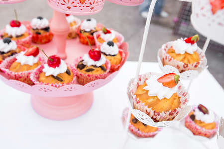 wedding cupcakes in iron baskets
