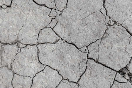 drought, cracked earth in gray. earth without rain. background
