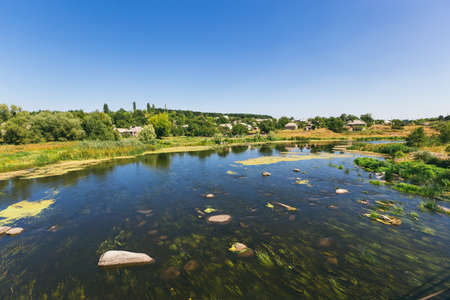 top view of the overgrown river, Ukrainian landscape, Ukrainian village.の写真素材