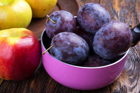 summer fruits, plums and apples, fresh fruitの写真素材