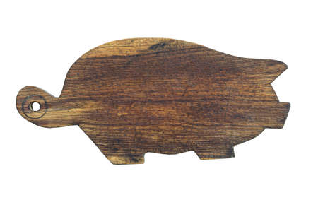 dark wooden board pig on a white background, isolatedの写真素材