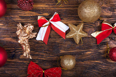 New Year's and Christmas. multi-colored Christmas toys on a wooden table, top view.の写真素材