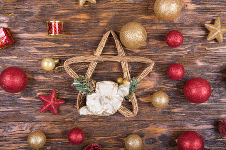 bright Christmas toy on a wooden background. Christmas and New Year, Christmas tree decoration.の写真素材