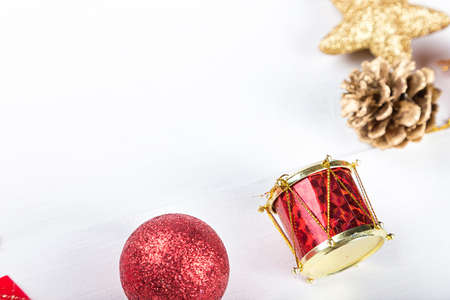 Christmas set, Christmas toys space for text on the greeting card. gold and red toy.の写真素材