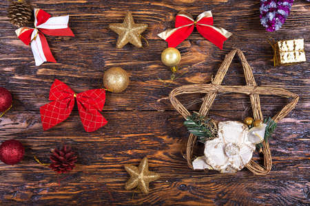 New Year's and Christmas. multi-colored Christmas toys on a wooden table, top view.の写真素材