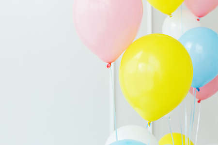 colored balloons on a white background, happy children's birthday party, childhoodの写真素材