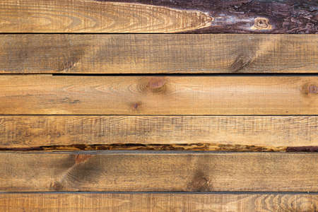 rough wooden brown background on boards is visible at the edges of the crustの写真素材