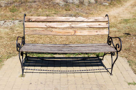 wooden bench in the park. no peopleの写真素材