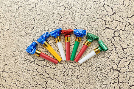 whistles to children's birthday on a white background craquelure, top viewの写真素材