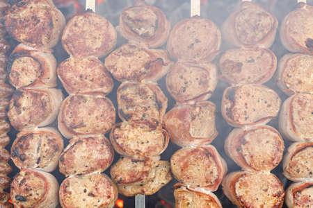barbecue on the grill, meat threaded on skewers, summer picnicの写真素材