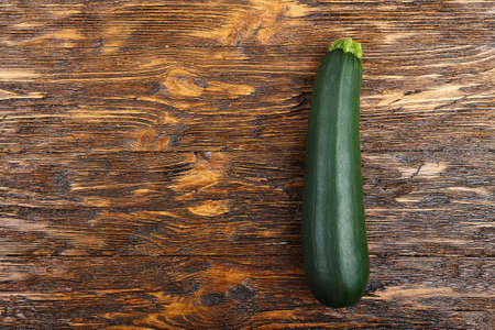 zucchini on a wooden background.  Food Horizontal Background. Top View, Flat, Overhead.の写真素材