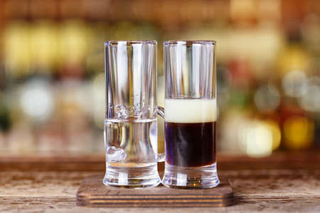 Biker Cocktail Double Rada - is drunk from two glasses at the same time. Cocktail on the basis of vodka, coffee and lemon liquorの写真素材
