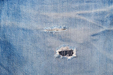Abstract background of shabby and worn jeans, horizontal photo