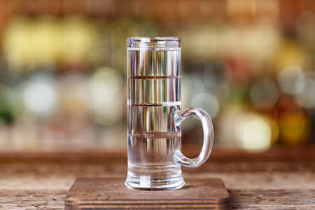 Audi cocktail on the basis of different types of alcohol: sambuca, coconut and citrus liqueur, white...