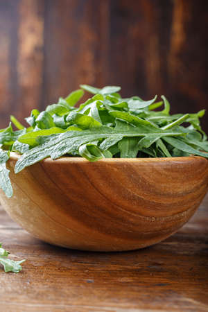 Rucola view from above, fresh rucola ruccola in a plate, space for text.の写真素材