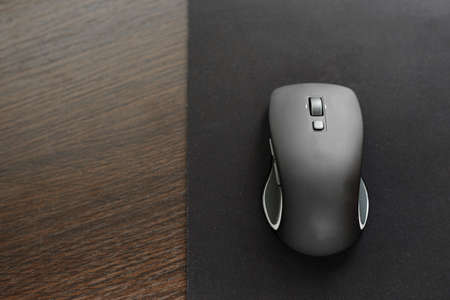 wireless computer mouse on the desktopの写真素材