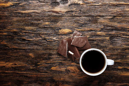Chopped chocolate on the wooden deskの写真素材