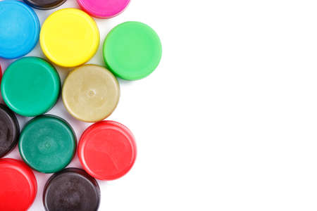 many plastic covers of different colors, isolated on white backgroundの写真素材