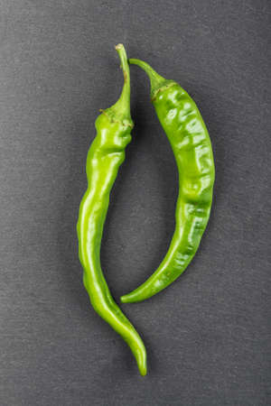 Green peppers . Horizontal photo with free space area for text or design.