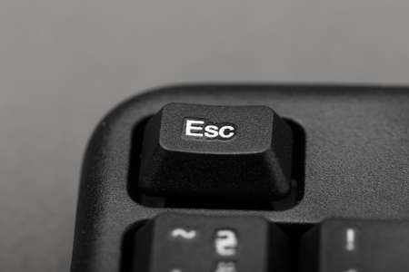 Escape button on the keyboard closeup, top view