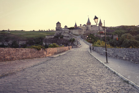 Beautiful castle on a mountain hill. Kamenetz-Podolsk, one of the historical monuments of Ukraine.のeditorial素材