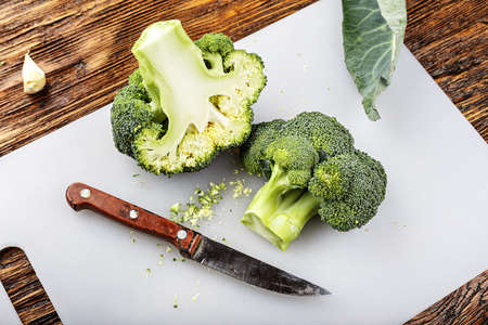 fresh broccoli on a cutting tableの写真素材