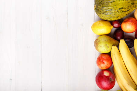 fruit background with exotic fruits on white background, fruit detox, space for textの写真素材