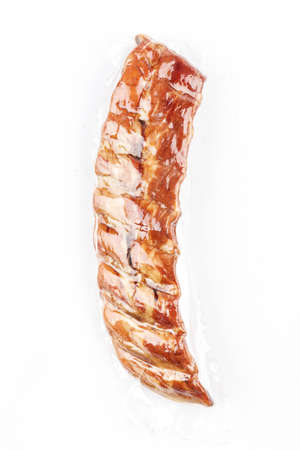 smoked ribs in vacuum, snack to beer, unhealthy food, isolatedの写真素材