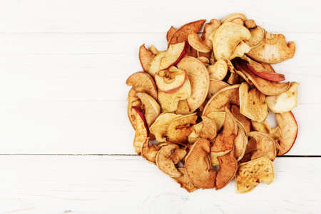 dried fruits scattered on the table, space for textの写真素材