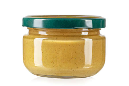 closed jar with mustard isolated on white background, place for text.Clipping path.の写真素材