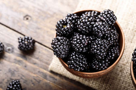 Blackberry on a wooden backgroundの写真素材