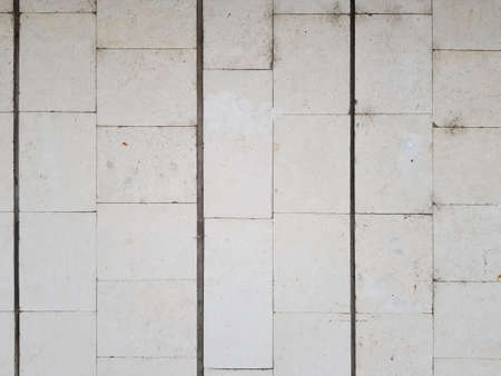 a wall of white bricks as a background. close-up. place for textの写真素材