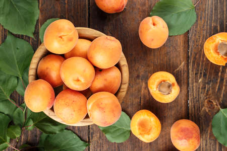 Ripe apricots in a plate. Fresh fruits. Organic foodの写真素材