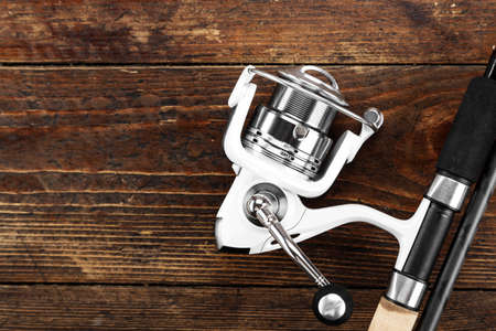 Fishing feeder and reel. space for text. top viewの写真素材